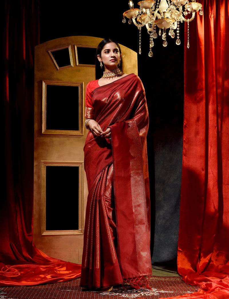 Maroon With Antique Zari Woven All Over Jacquard Weave Pattern Saree With Rich Brocade Pallu And Blouse And Knitted Tassle At Pallu
