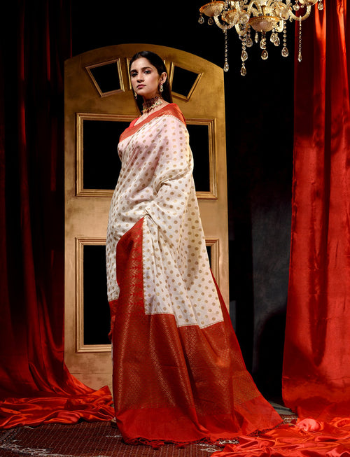 Off-White With Red Dupion Silk Banarasi Saree With Jacquard Weave Floral Body And Beautiful Border