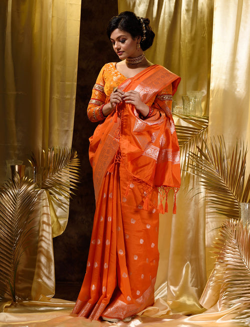 Orange With Silver Zari Woven Banarasi Silk Saree With Beautiful Jacquard Woven Zari Buti And Border